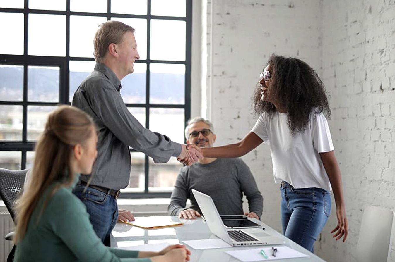 A white man having a hand shake